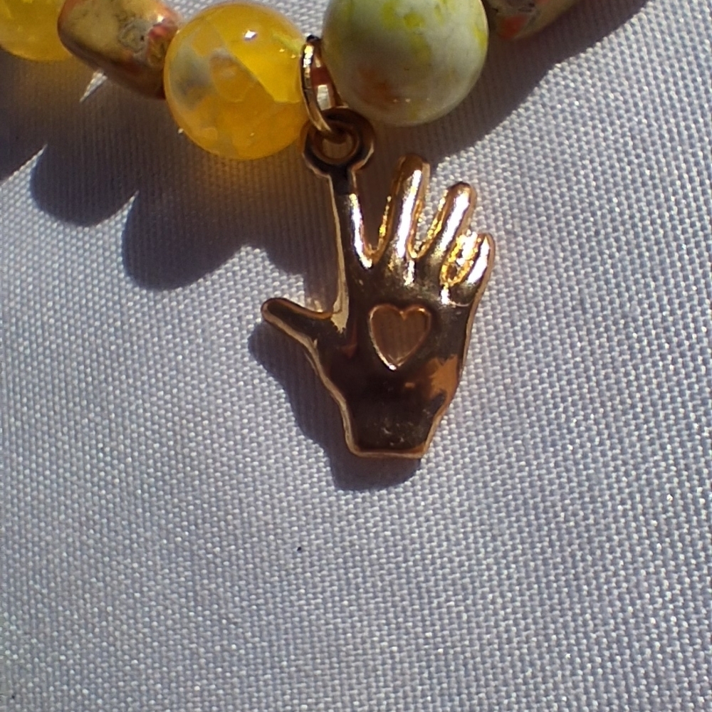 Yellow and Orange Beaded Bracelet with Hand Charm